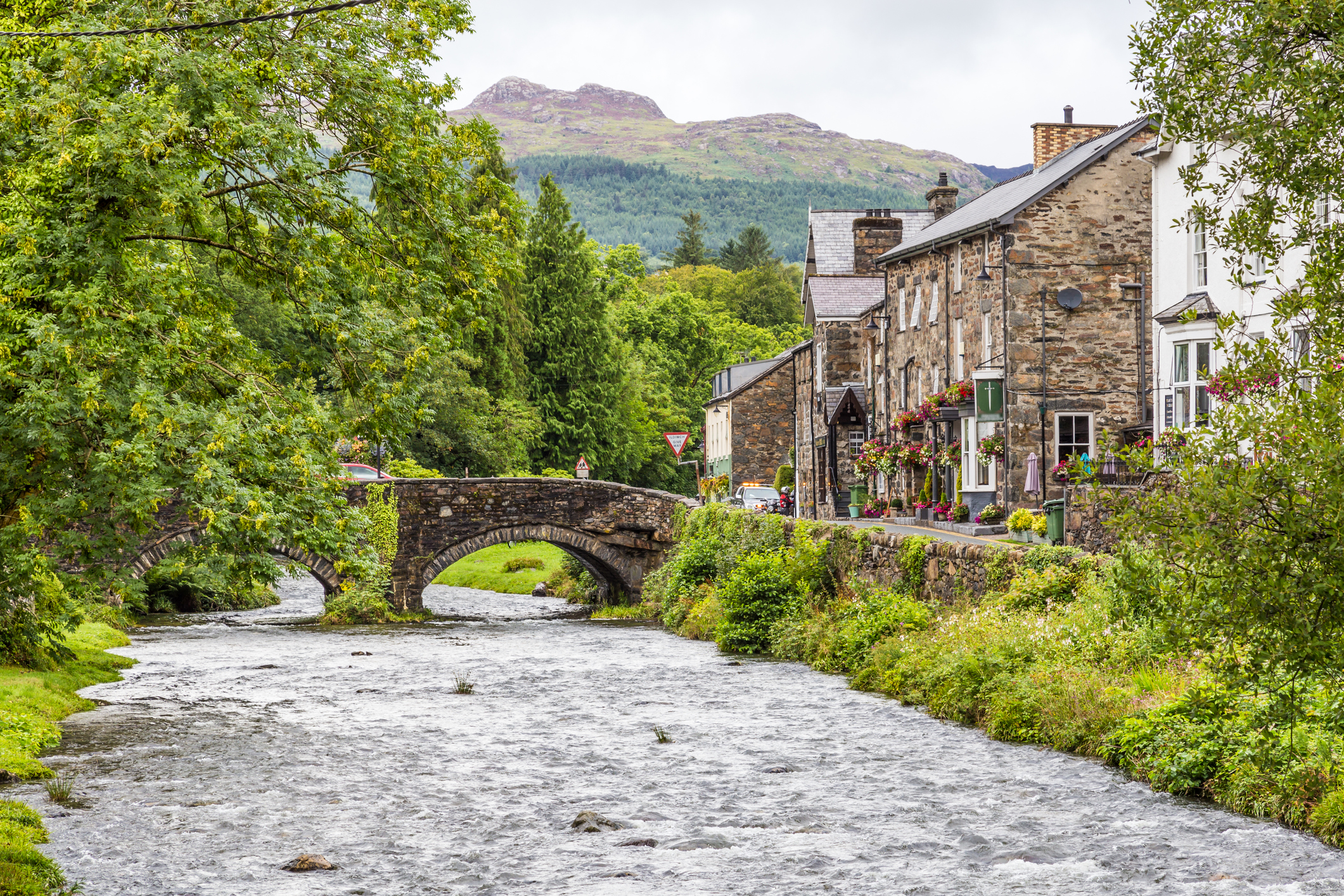 Beddgelert town and bridge in the heart of Snowdonia National Park in Gwynedd, Wales, UK