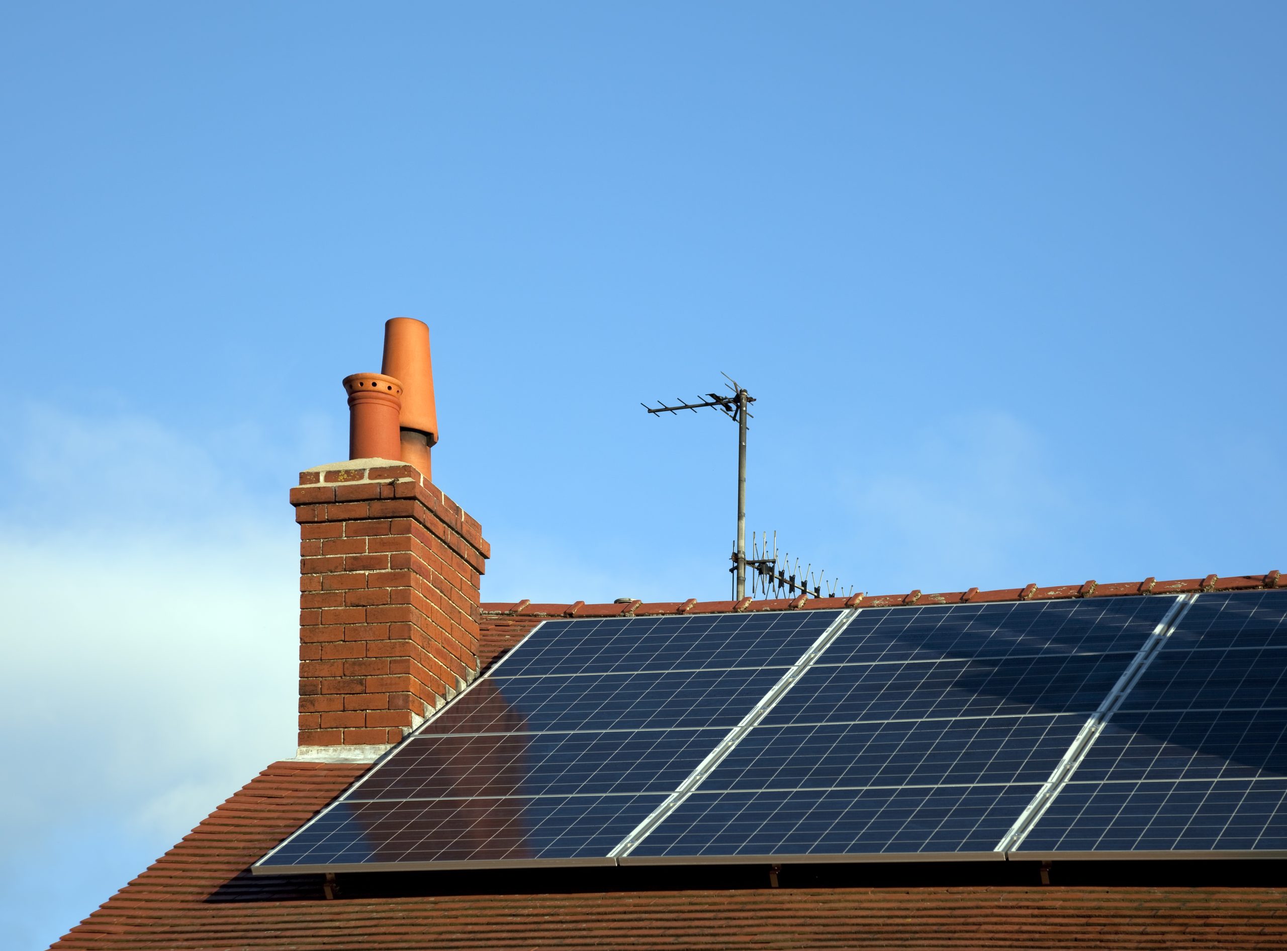 Solar panels installed on a house roof.