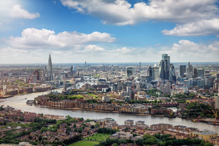 Elevated panorama of the London skyline along the river Thames from London Bridge until the City.