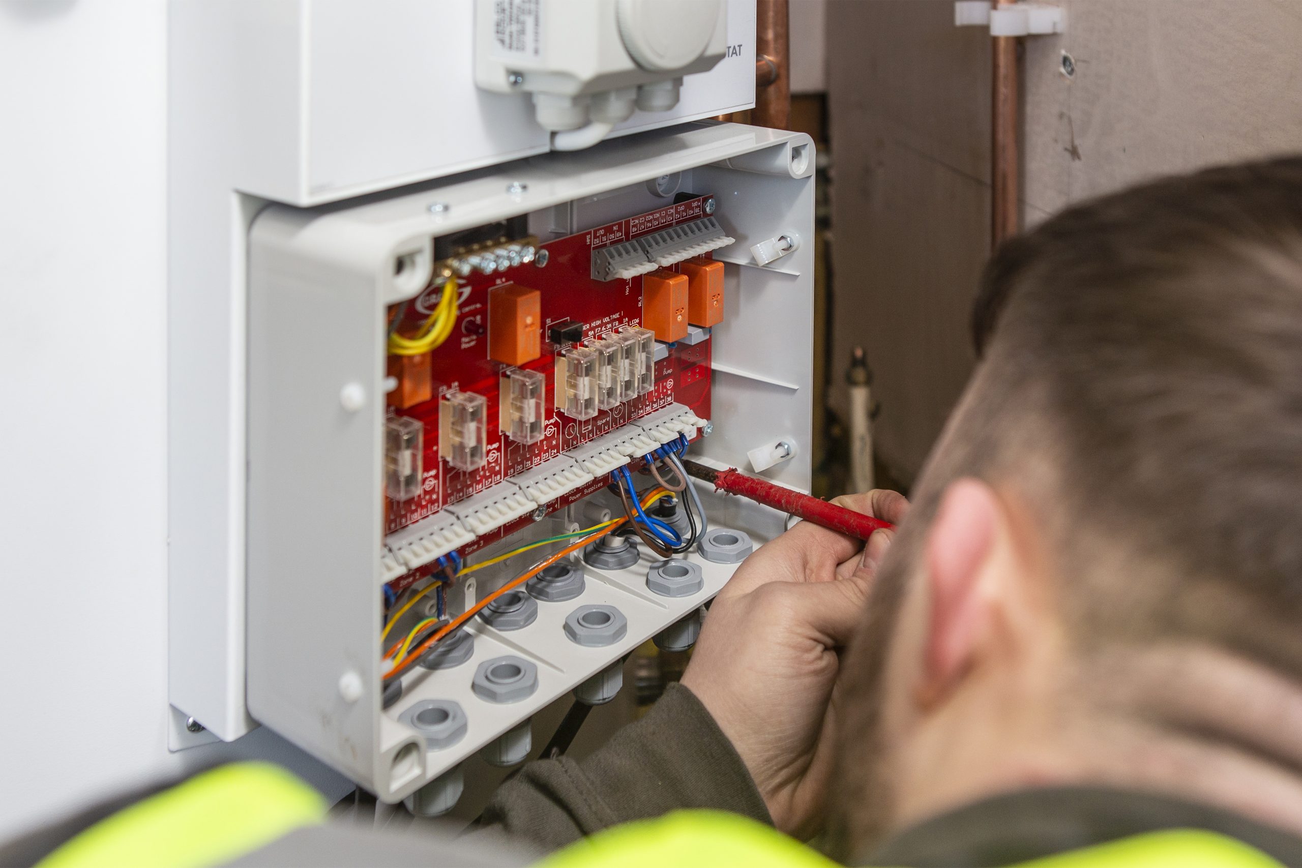 installer working on heating unit